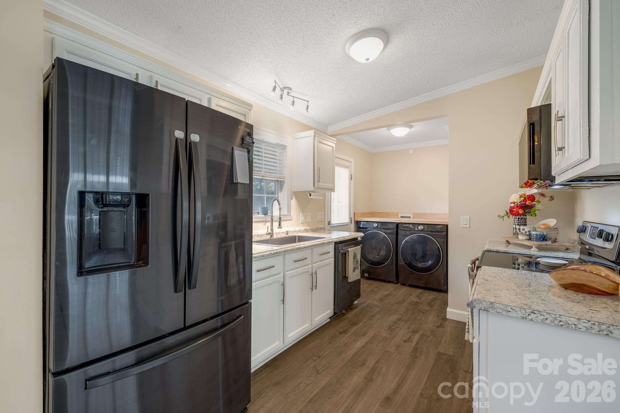 An updated kitchen ready for everything from morning coffee to dinner prep. - 710 Stoney Mountain Road, Hendersonville