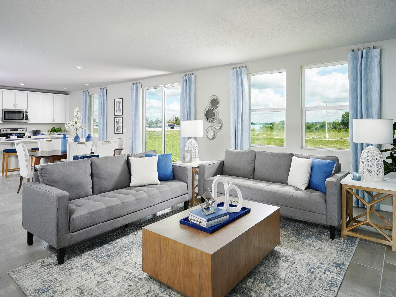 Step into the elegance of VillaMar, a thoughtfully designed home where sophistication meets everyday comfort. This expansive floorplan offers four spacious bedrooms, three full baths, and a versatile family room, providing exceptional flexibility for modern living. At the heart of the home, the gourmet-inspired kitchen seamlessly connects to the dining area and grand great room, creating an inviting yet refined space perfect for entertaining guests or enjoying memorable moments with family. Thoughtfully crafted with an emphasis on openness, comfort, and style, VillaMar delivers a luxurious living experience designed to complement today's discerning homeowner. - 3992 GIORGIO DR, WINTER HAVEN