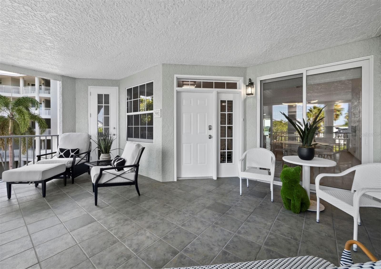 Front deck and entry - 1260 DOLPHIN BAY WAY #301, SARASOTA