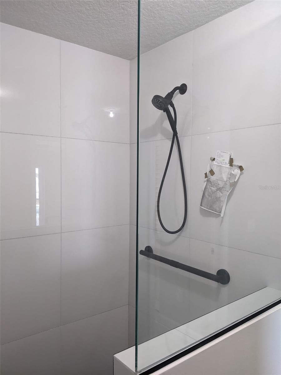 Primary bath updated shower - 2526 RUSK CT, DELTONA