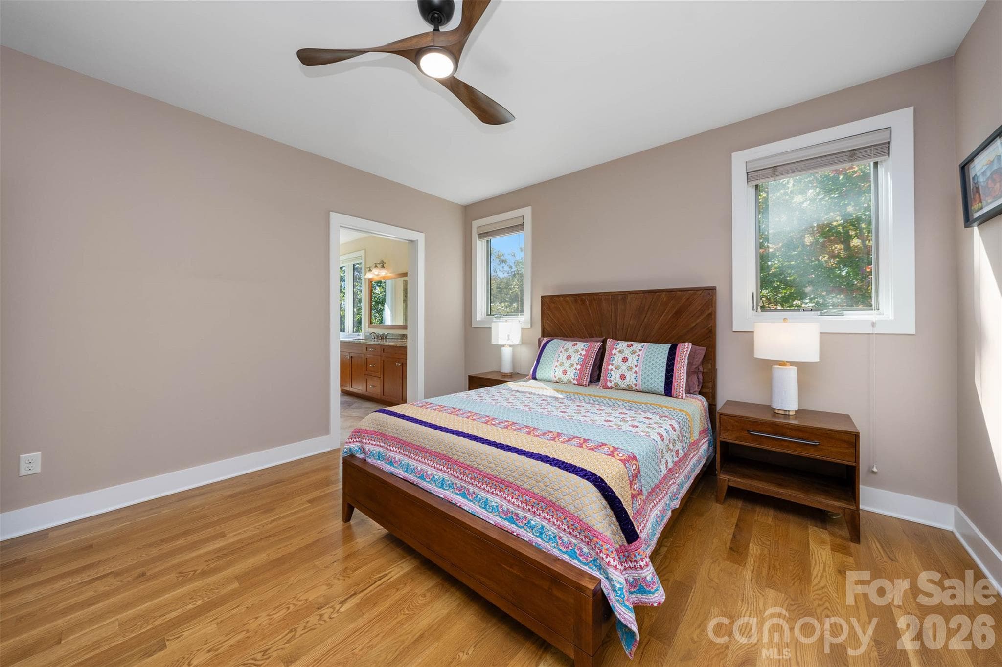 Primary bedroom suite on the main level. - 351 Chapel Road, Black Mountain