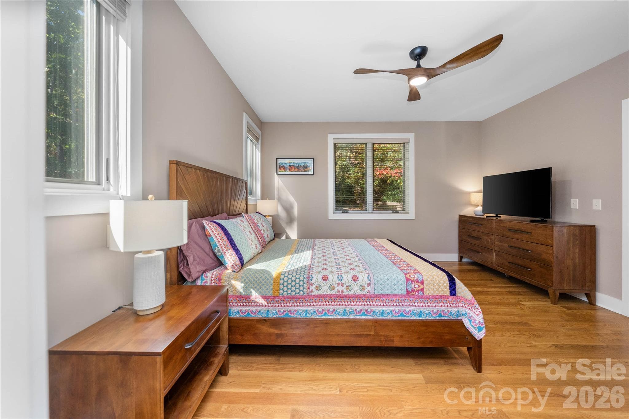 Primary bedroom suite on the main level. - 351 Chapel Road, Black Mountain