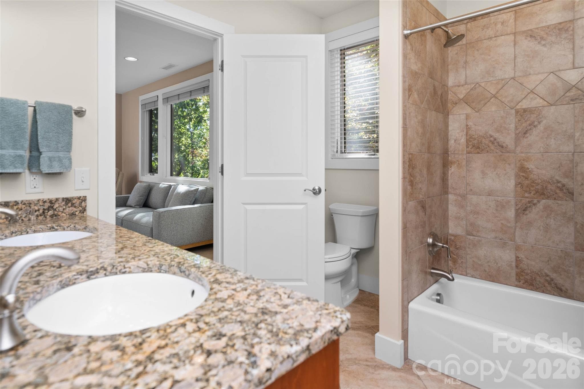 Lower level  jack and Jill full bath between the family room and bedroom #2 - 351 Chapel Road, Black Mountain
