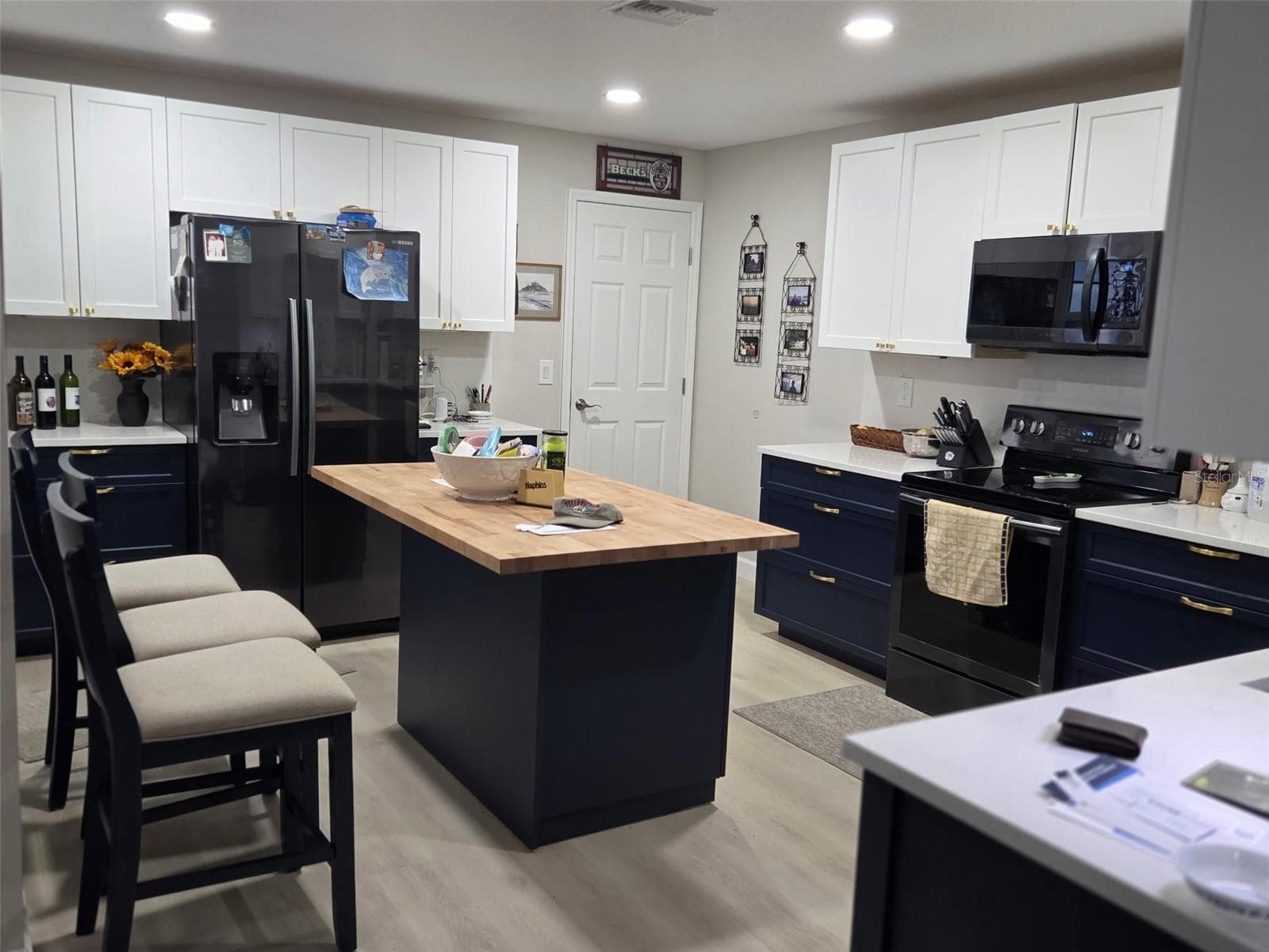 Updated kitchen with 2 toned shaker cabinets - 2526 RUSK CT, DELTONA