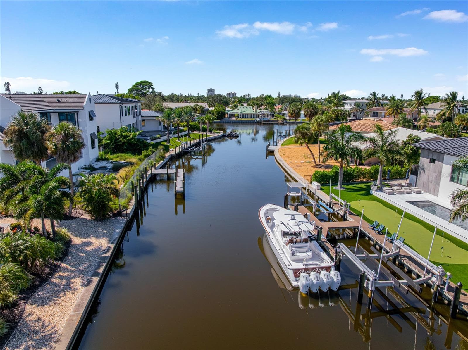 Boating is part of everyday life here, with scenic waterways and access from this Siesta Key waterfront setting. - 5376 SHADOW LAWN DR, SARASOTA