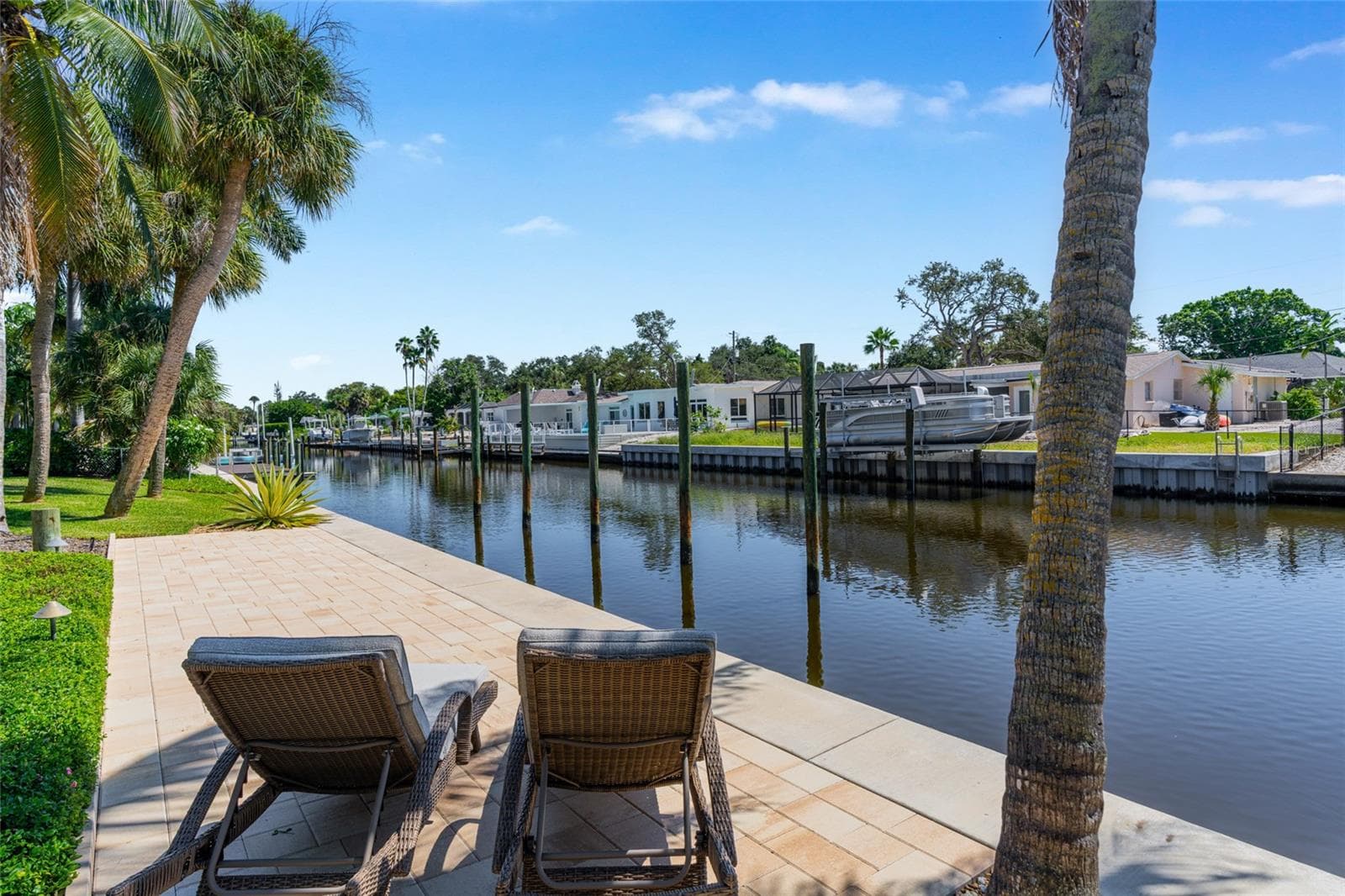 A peaceful place to relax by the water, with canal views just beyond the improved waterfront area. - 5376 SHADOW LAWN DR, SARASOTA