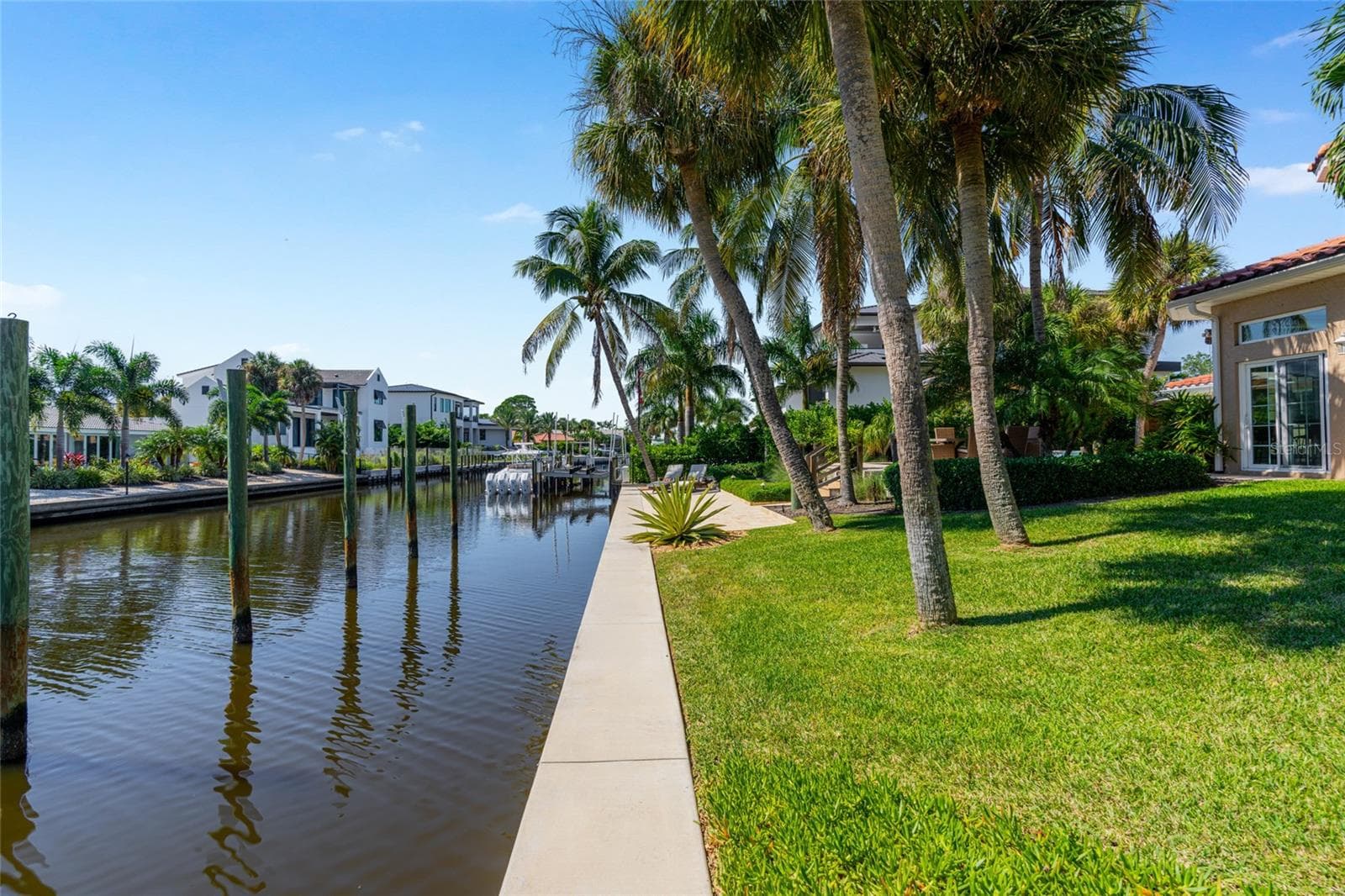 Canal Frontage View, highlighting the connection to the water and Siesta Key lifestyle. - 5376 SHADOW LAWN DR, SARASOTA