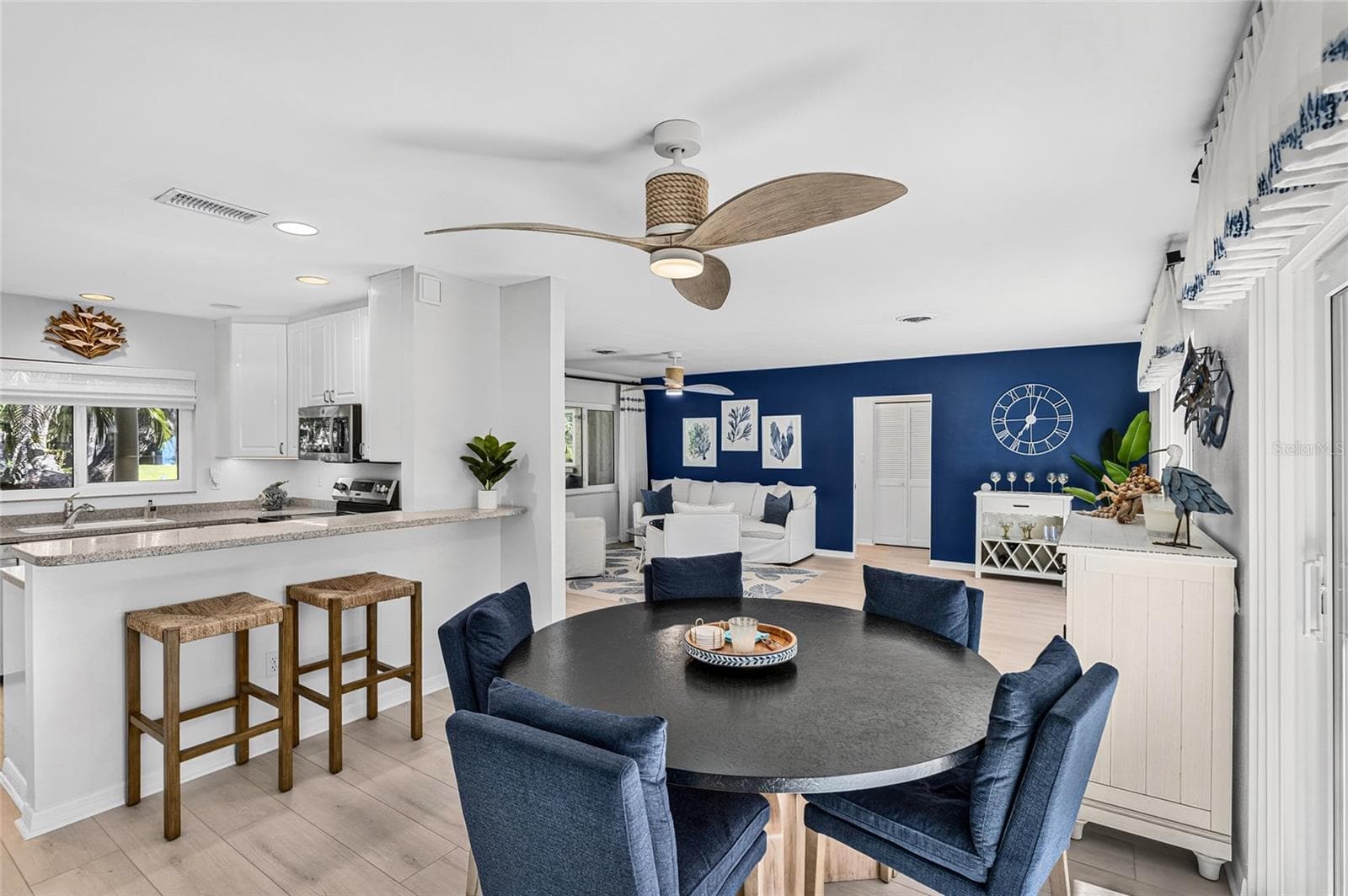 Open Kitchen Living View, designed for everyday living and easy entertaining. - 5376 SHADOW LAWN DR, SARASOTA