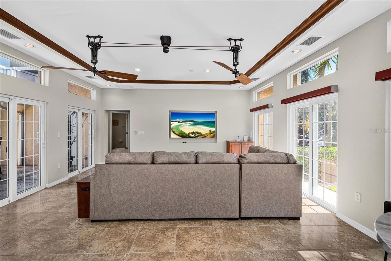 Rear view of the approximately 424 square foot flex room, offering space for a media room, gym, game room, lounge or other flexible use. - 5376 SHADOW LAWN DR, SARASOTA