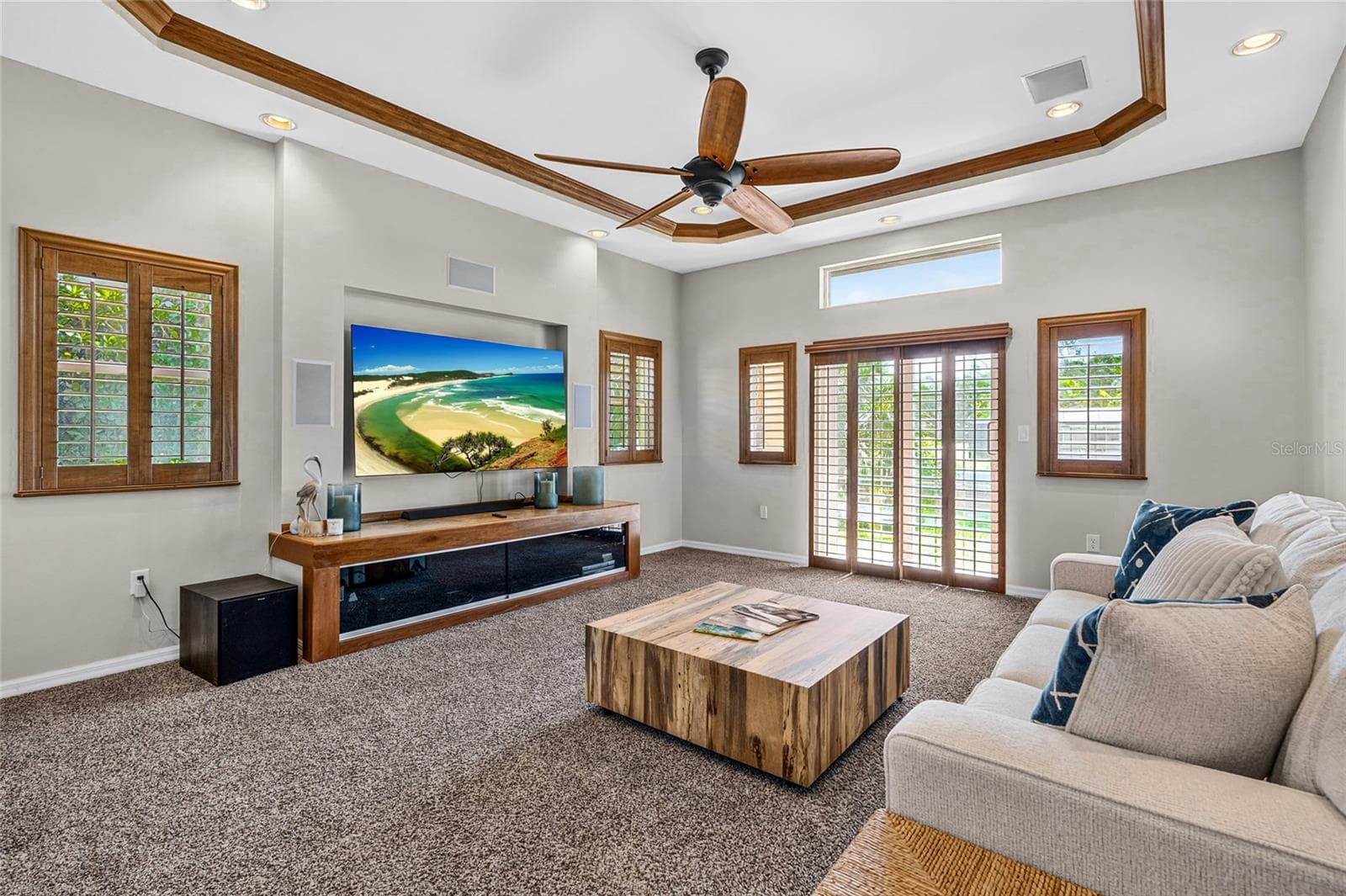 Bedroom 5 was created from a portion of the former oversized media and flex area, while preserving a separate approximately 424 square foot flex room. - 5376 SHADOW LAWN DR, SARASOTA