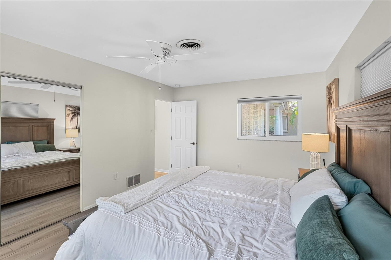 Secondary Bedroom Two Second View, offering comfortable space and flexible furniture placement. - 5376 SHADOW LAWN DR, SARASOTA
