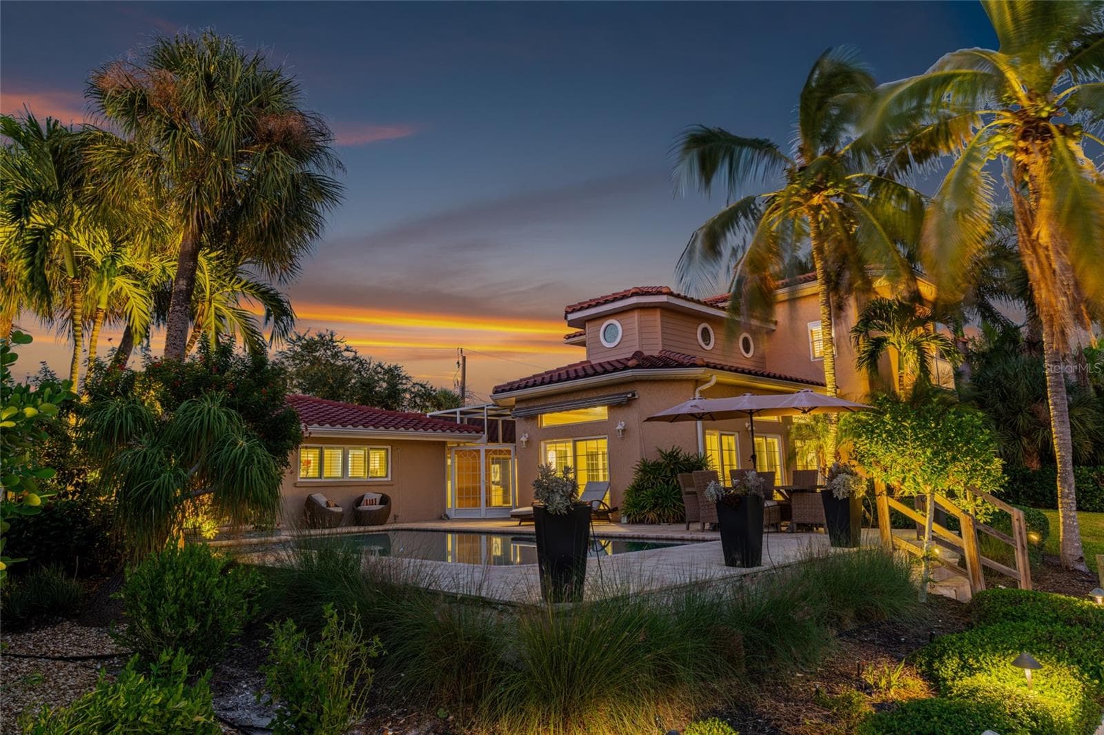Rear Exterior Night. - 5376 SHADOW LAWN DR, SARASOTA