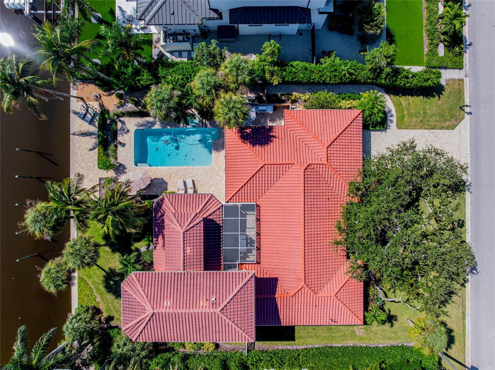 Top Down Property Aerial, providing a broader perspective of the property and its Siesta Key setting. - 5376 SHADOW LAWN DR, SARASOTA