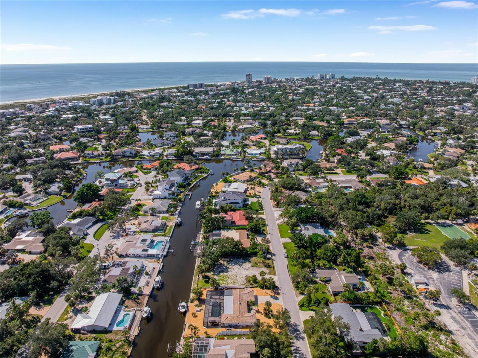 Another aerial view highlighting the home’s convenient proximity to the Gulf and Siesta Key Beach. - 5376 SHADOW LAWN DR, SARASOTA