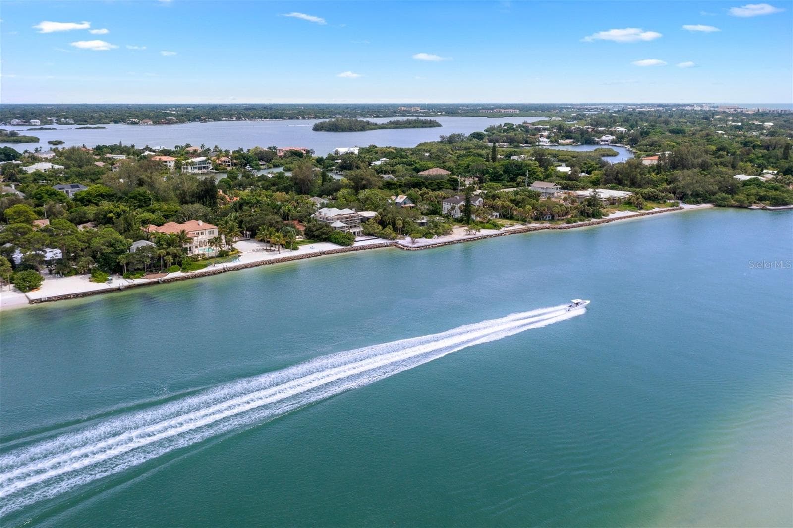 Siesta Key living is made for the water, with boating, sunshine and beautiful coastal scenery close to home. - 5376 SHADOW LAWN DR, SARASOTA