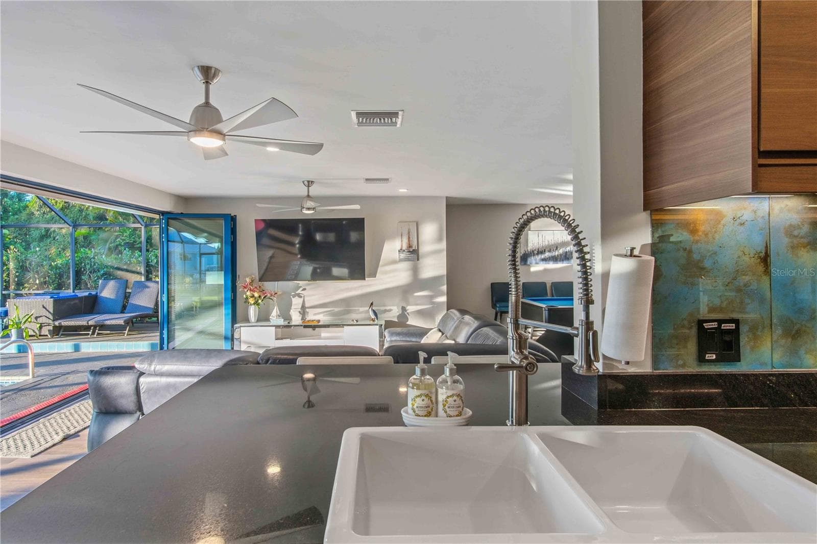 Kitchen looking into living room - 131 CASA LN, PUNTA GORDA