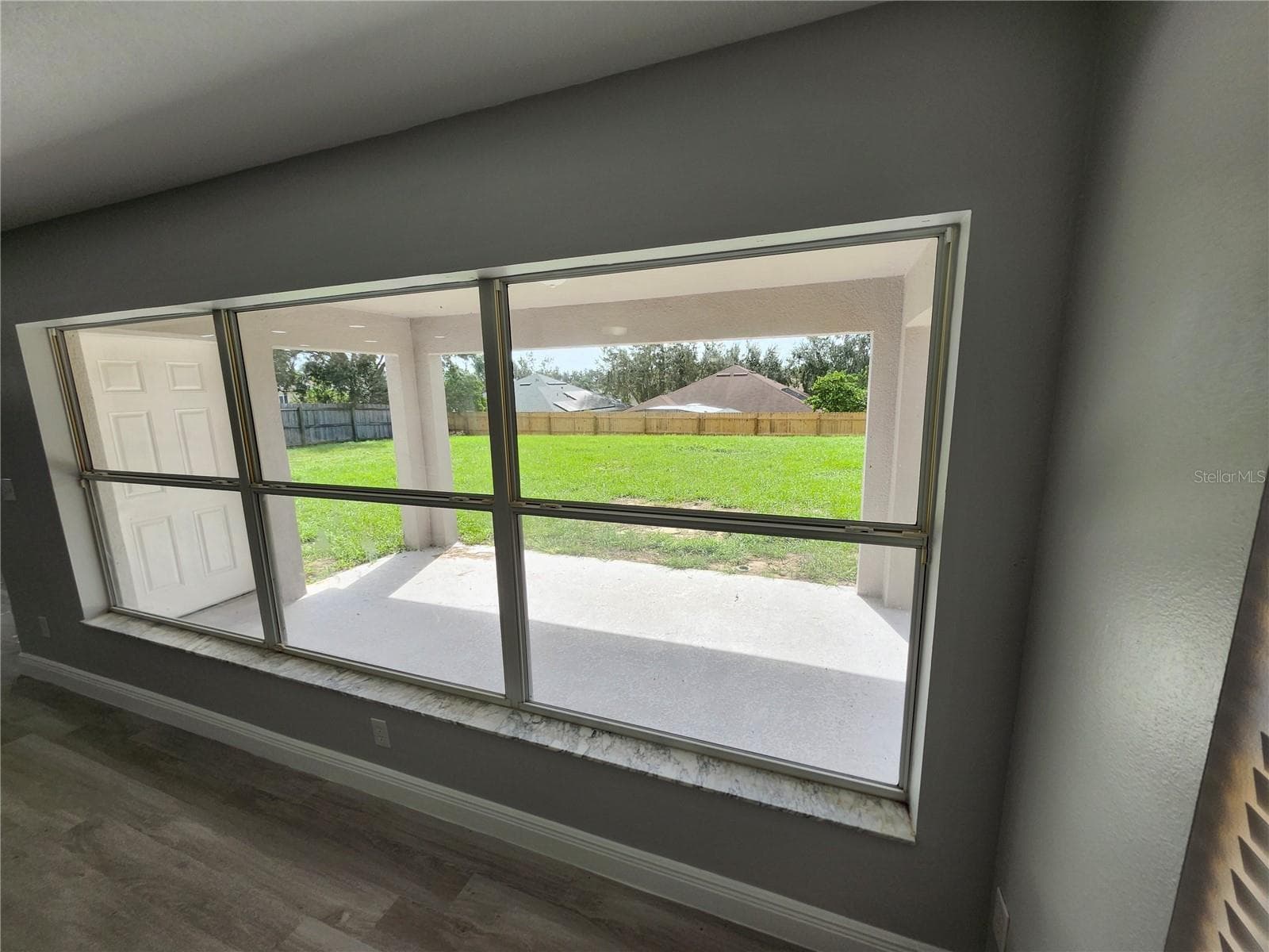 View of fenced backyard - 3069 TOBAGO AVE, CLERMONT