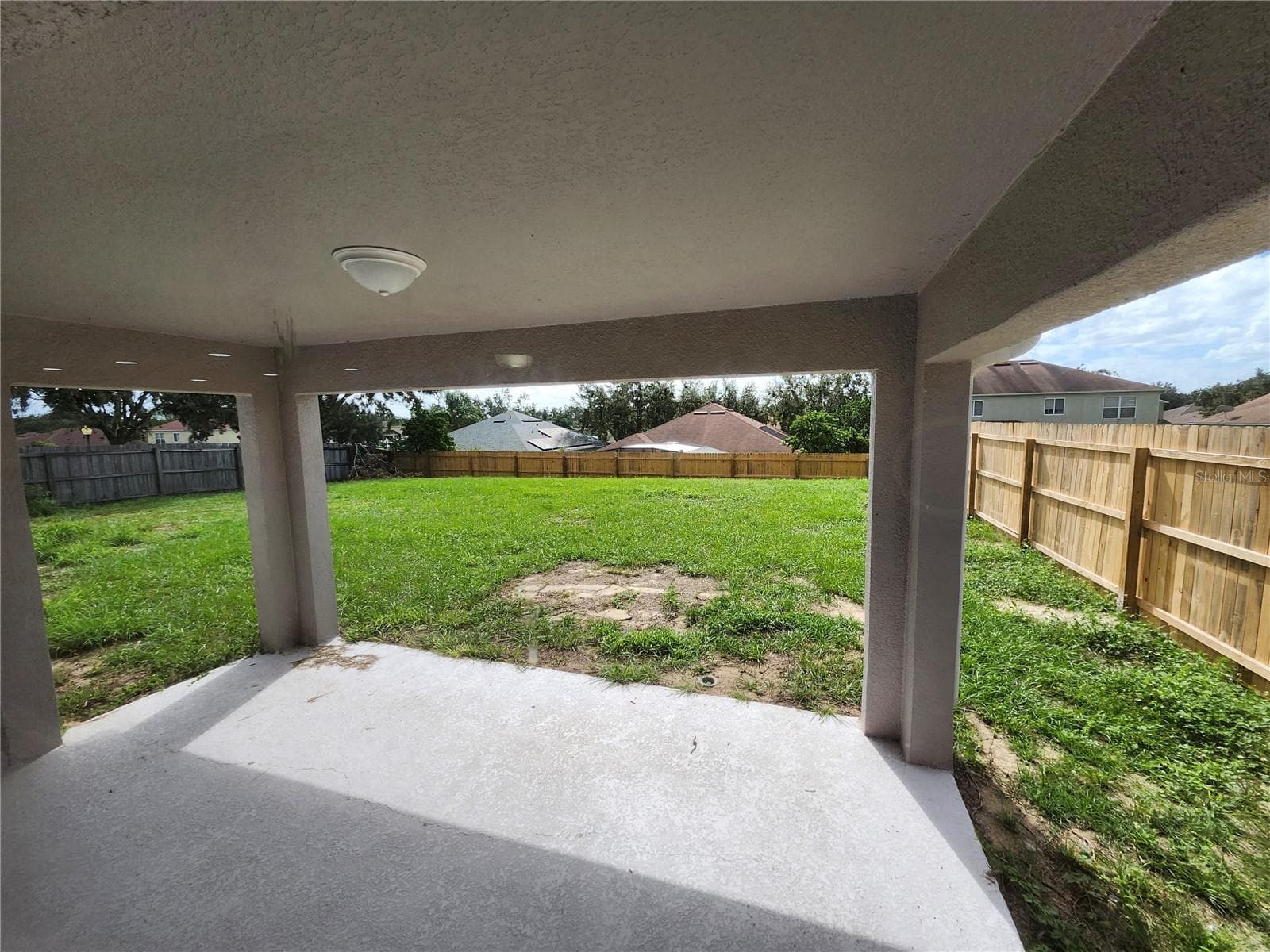 Lanai and fencing - 3069 TOBAGO AVE, CLERMONT