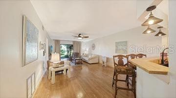 Breakfast Bar & Living Room - 5326 LAKE ARROWHEAD TRL #7, SARASOTA