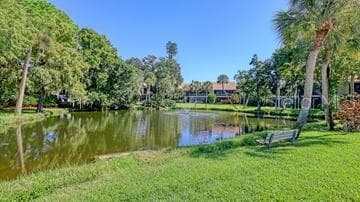 Serene Lake with Benches - 5326 LAKE ARROWHEAD TRL #7, SARASOTA