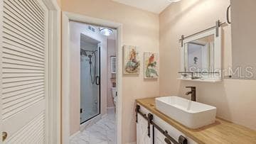 Primary Bathroom and a Walk-In-Closet to the Left - 5326 LAKE ARROWHEAD TRL #7, SARASOTA