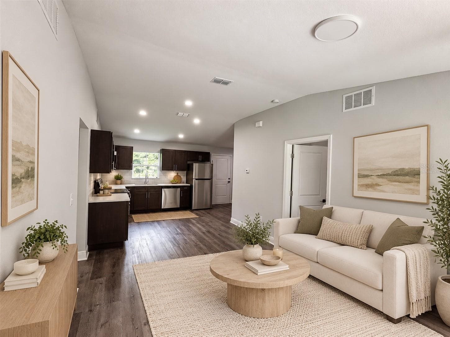 Virtually staged living area and kitchen - 13473 SW 60TH AVENUE RD, OCALA