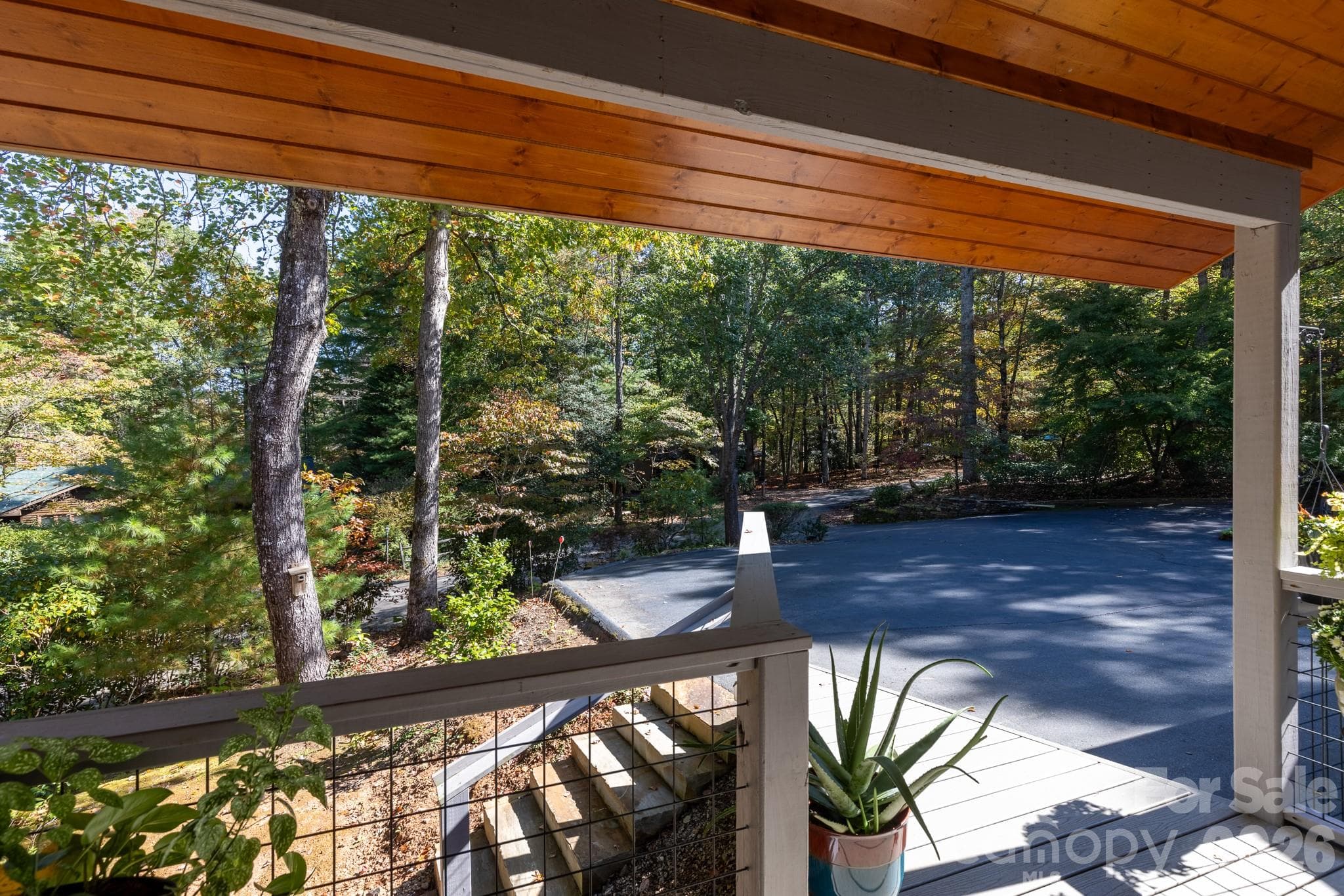 Inviting covered front entry with convenient access from the paved parking area. - 524 Three Mile Knob Road, Pisgah Forest