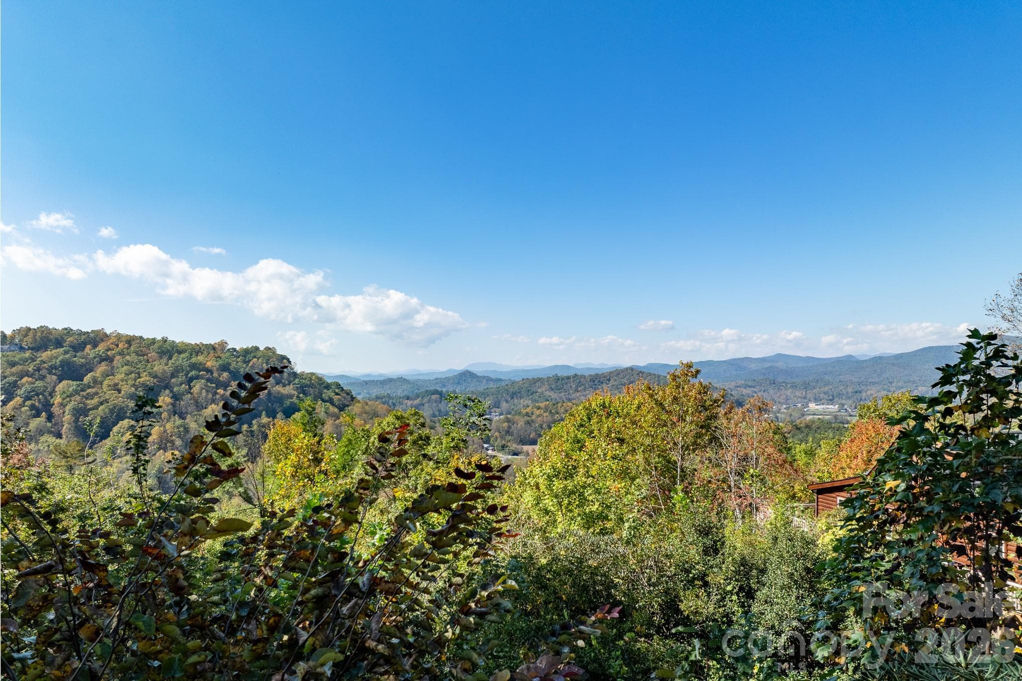 Expansive long-range mountain views stretching across the surrounding valleys and forested hillsides. - 524 Three Mile Knob Road, Pisgah Forest