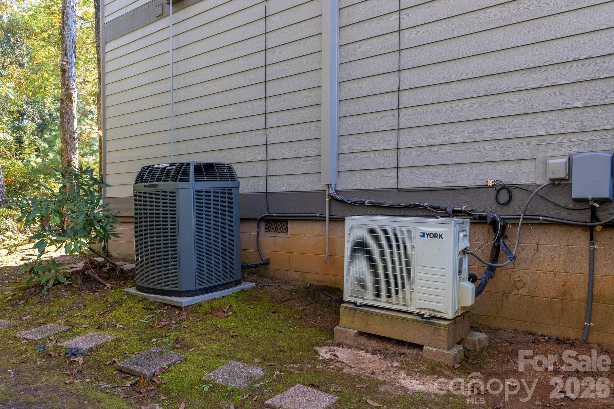 Exterior HVAC equipment includes a large central air-conditioning unit a - 524 Three Mile Knob Road, Pisgah Forest