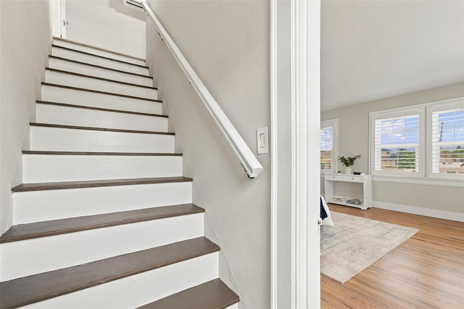 Stairs leading to the partially finished attic - 5426 VENETIAN BLVD NE, ST PETERSBURG