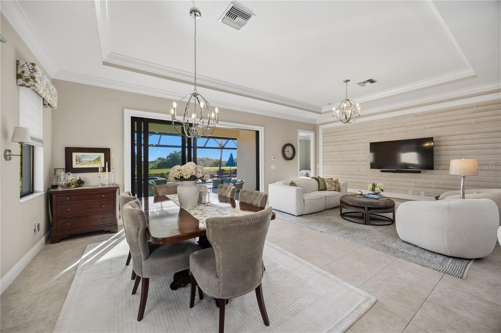 Open concept dining room to living room - 24232 GALLBERRY DR, VENICE