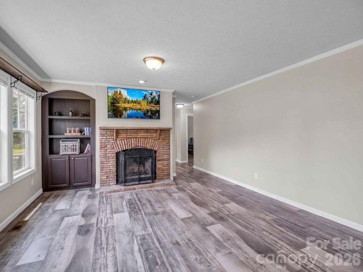 Dining/Den Area w/Woodburning Fireplace and Built-in Hutch - 213 Big Oak Road, Hendersonville