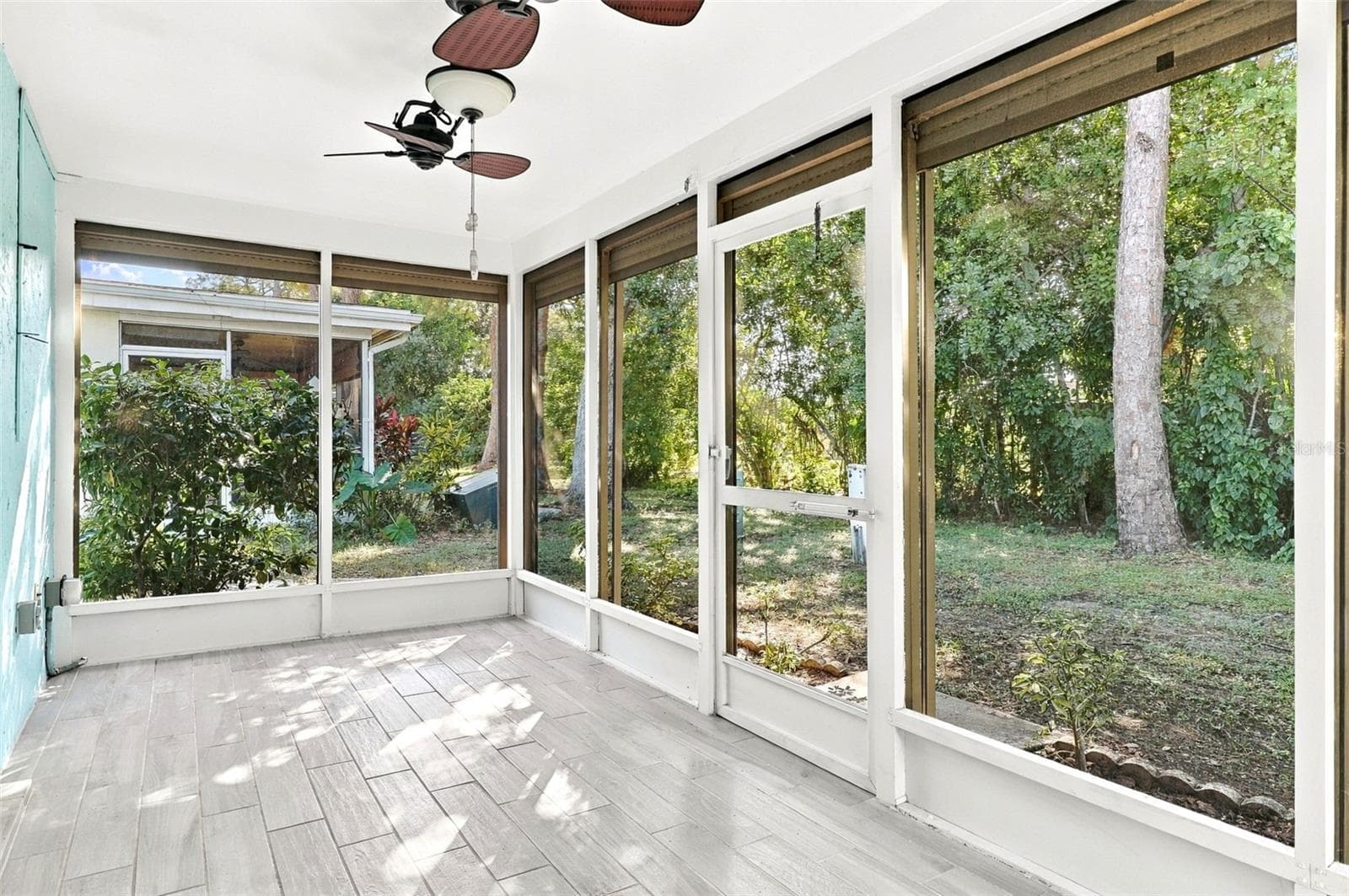 Lanai with motorized roll-down shutters - 6272 GREEN VIEW CIR #114, SARASOTA