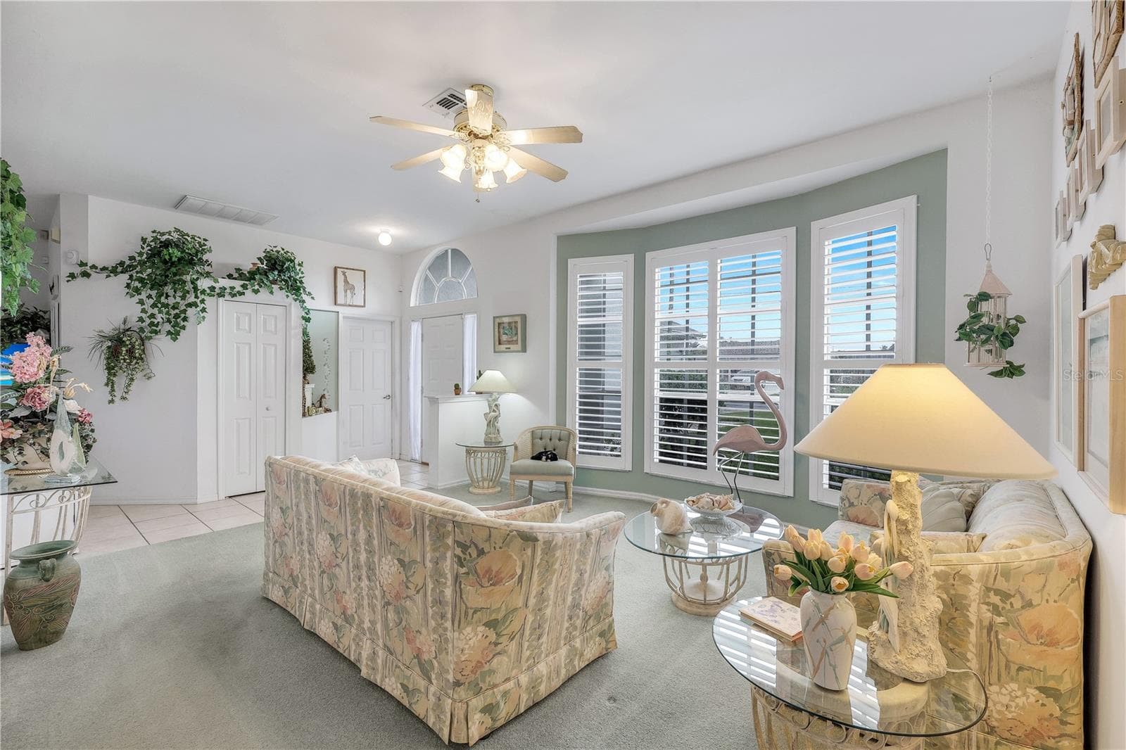 Living room and entry to home. - 305 SE 31ST ST, CAPE CORAL