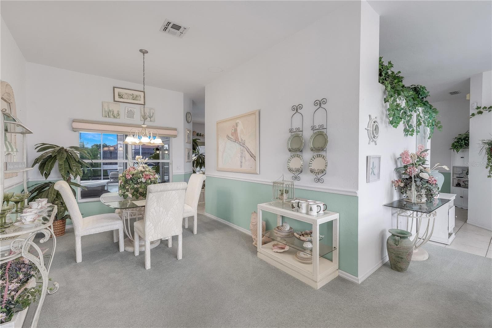 Formal dining room view from living room. - 305 SE 31ST ST, CAPE CORAL