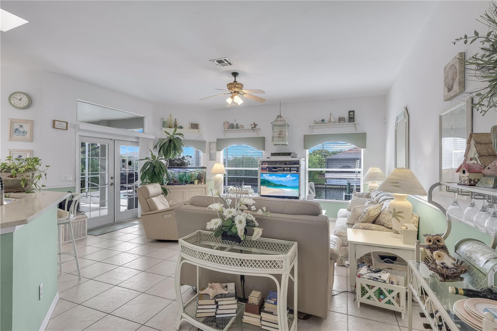 Family room with view of the water. - 305 SE 31ST ST, CAPE CORAL