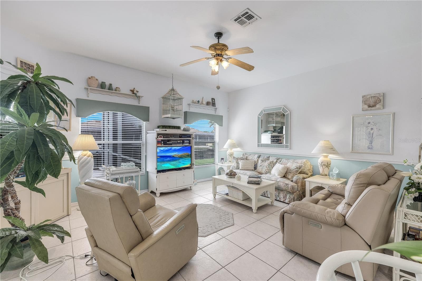 Spacious family room with view of the water. - 305 SE 31ST ST, CAPE CORAL