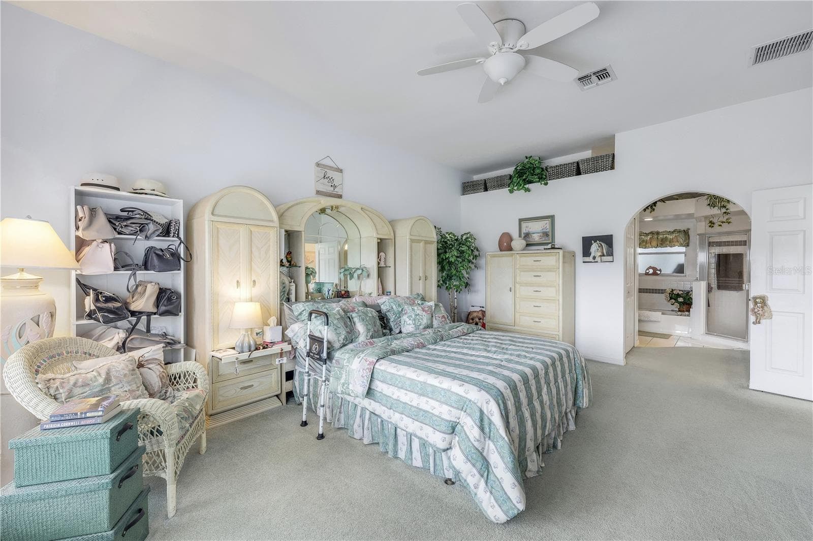 Huge primary bedroom toward ensuite bathroom. - 305 SE 31ST ST, CAPE CORAL