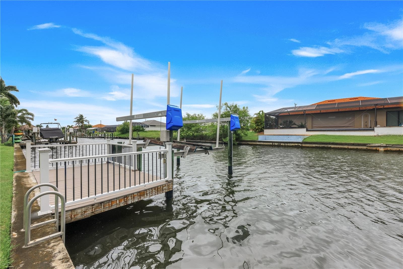 Dock and lift. - 305 SE 31ST ST, CAPE CORAL