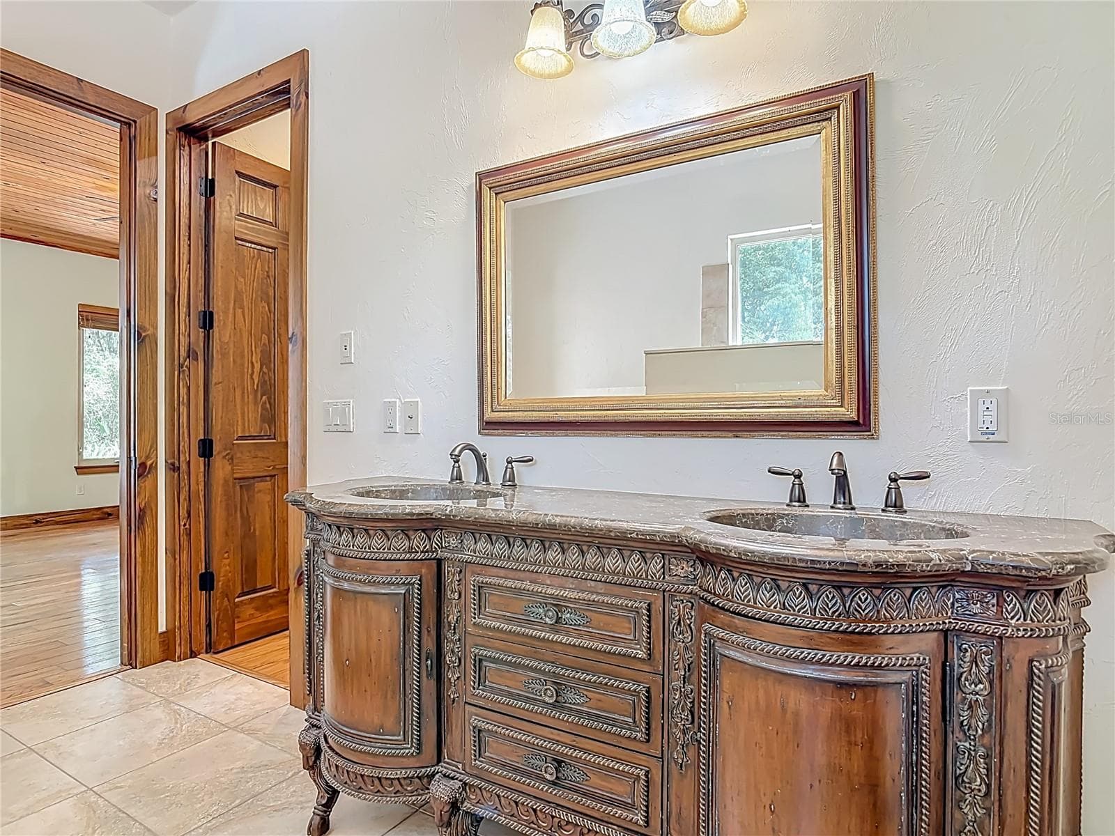 Primary ensuite bathroom has jacuzzi tub and separate shower. - 250 GARDEN ST, LAKE HELEN