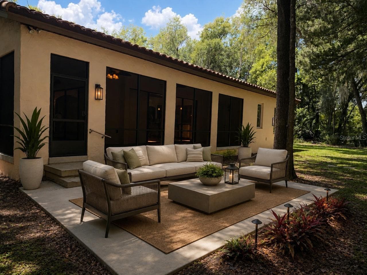 Back yard, virtual staged patio - 250 GARDEN ST, LAKE HELEN