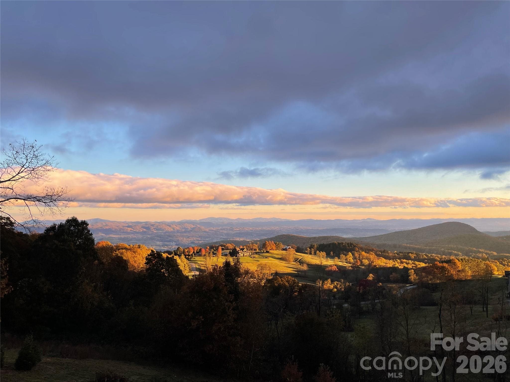 Sunset view from the deck of this lovely home! - 89 N Snow Ridge Drive, Hendersonville