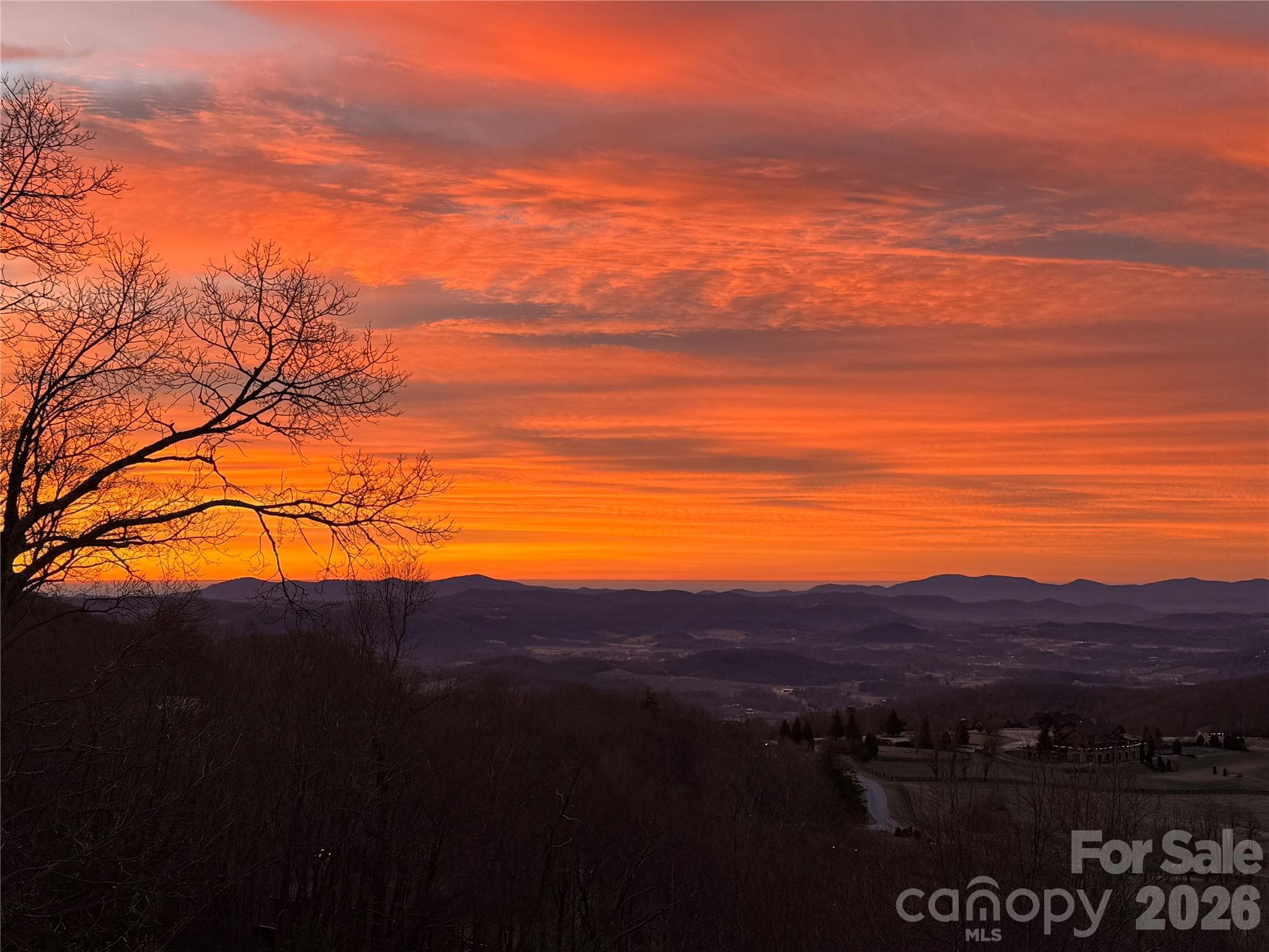 Sunset view from the deck of this lovely home! - 89 N Snow Ridge Drive, Hendersonville