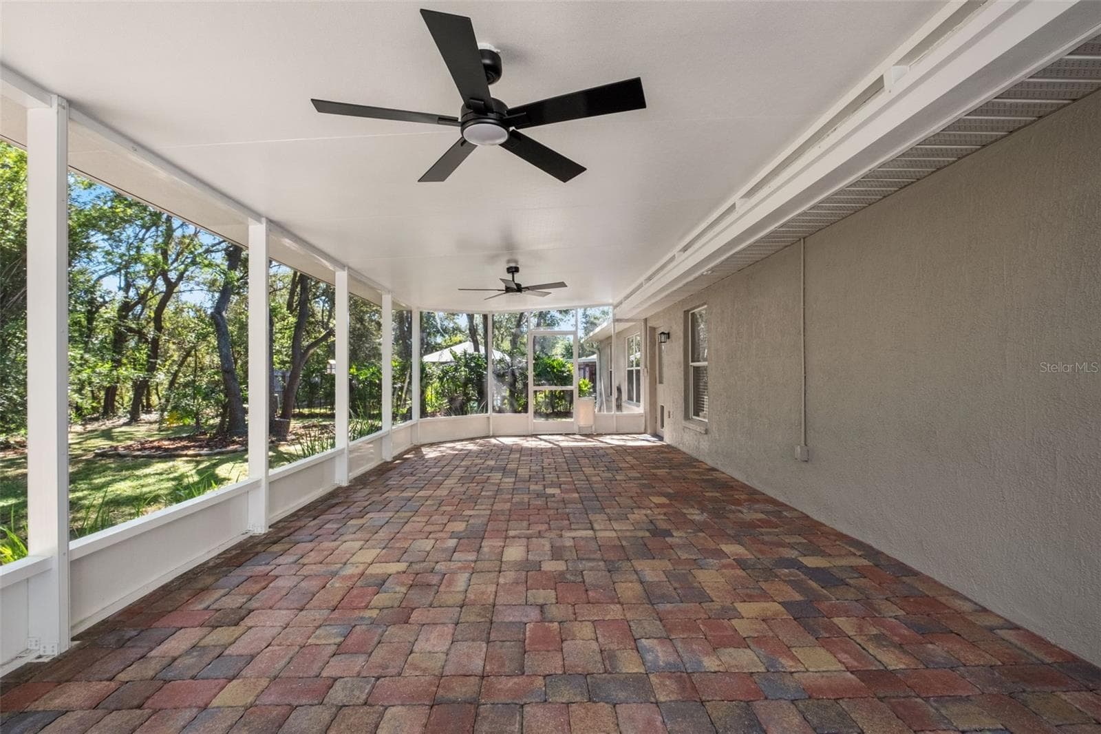 Expansive Screened Rear Porch with Pavers - 2138 FAIRVIEW RD, SPRING HILL