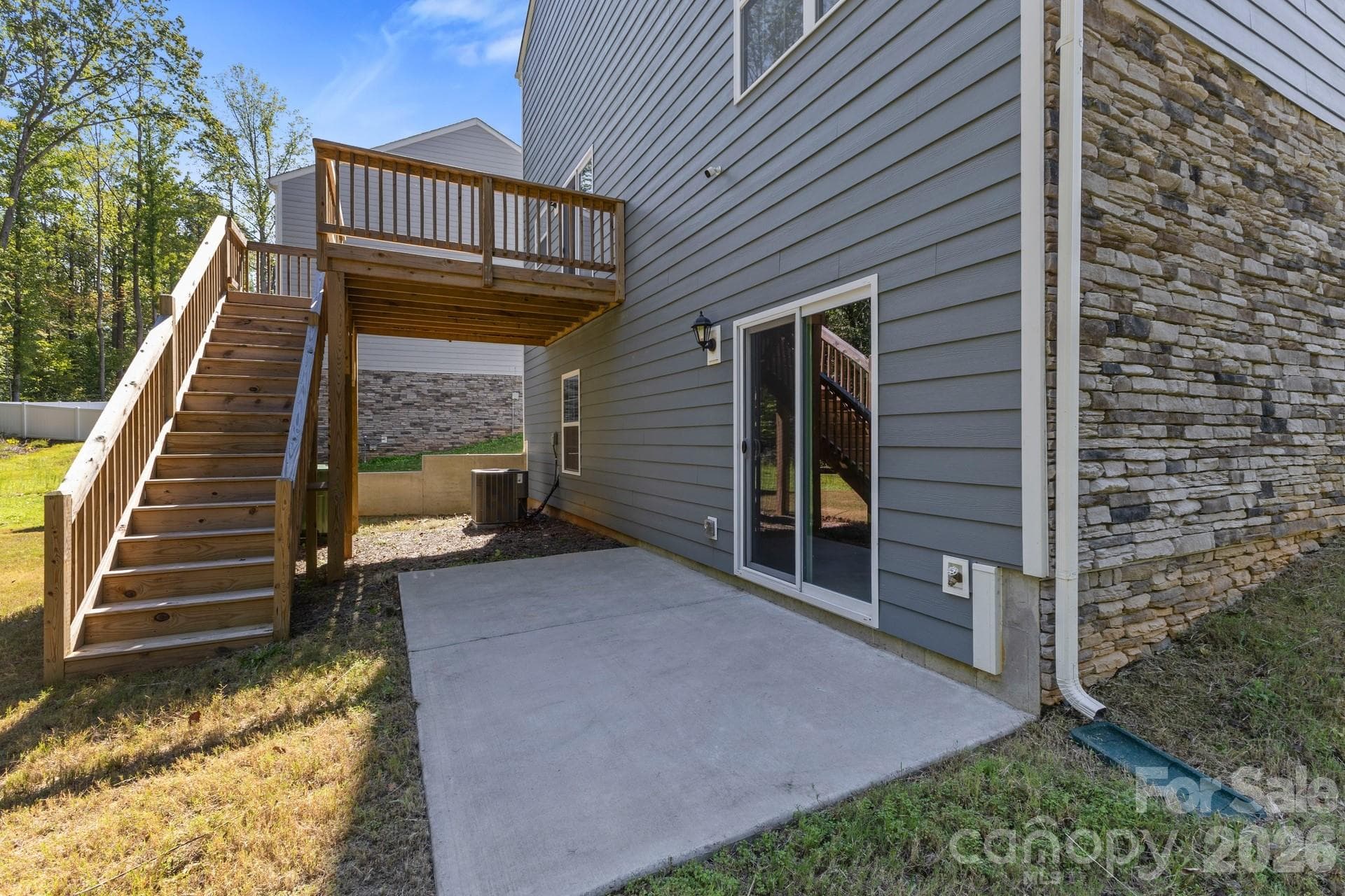 Basement-level patio located off the recreation/media room. - 3741 Stanley Creek Drive, Mount Holly