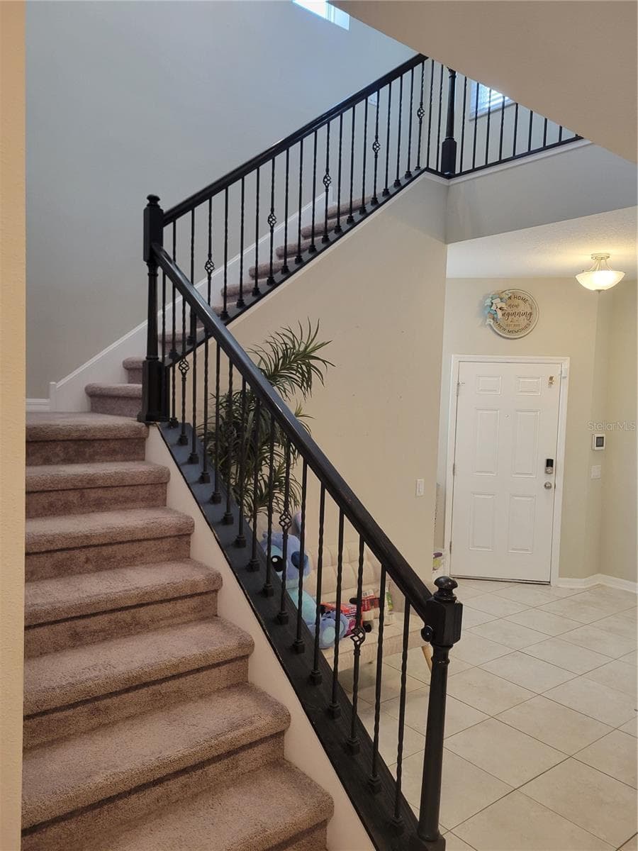 Stairs to the second floor - 37868 BEACON BRICK DR, ZEPHYRHILLS