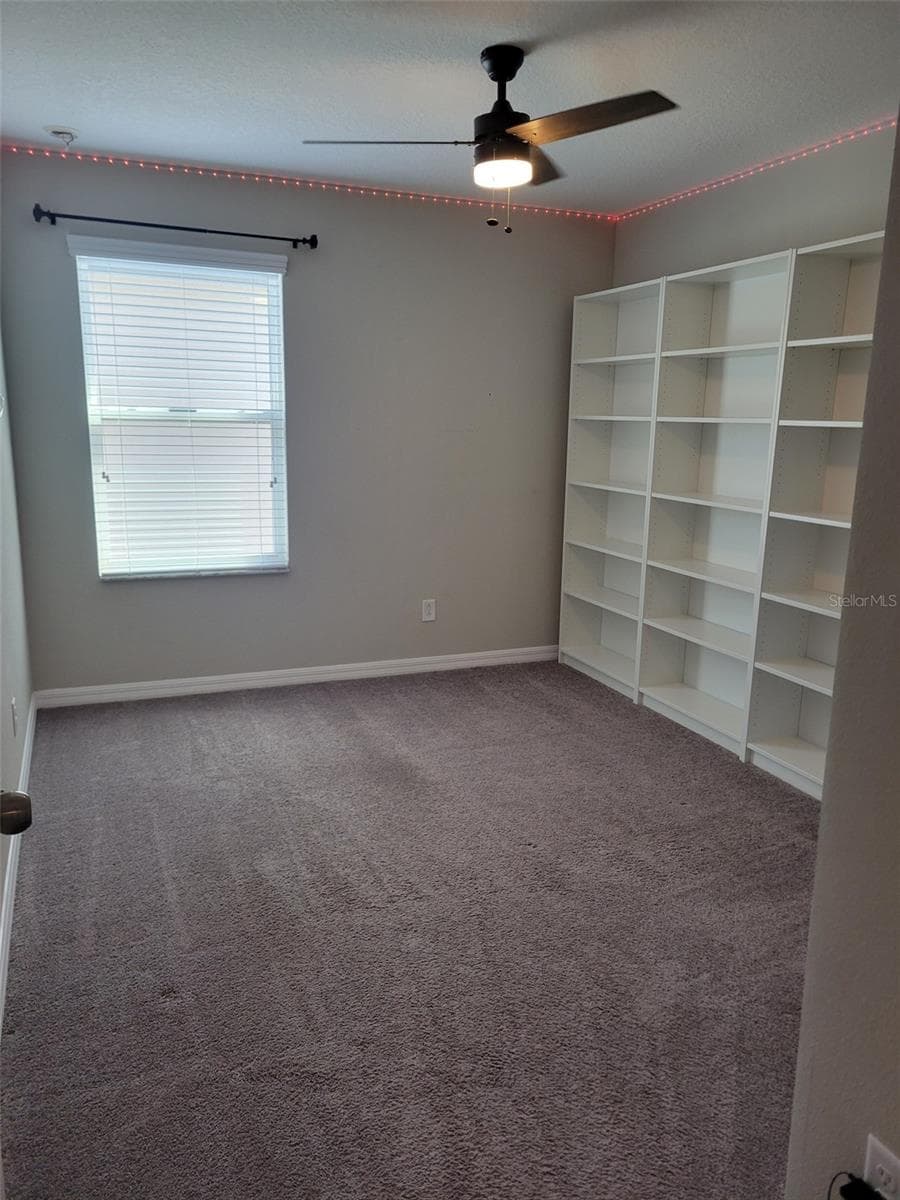 Look at all that storage in one of the upstairs bedrooms - 37868 BEACON BRICK DR, ZEPHYRHILLS