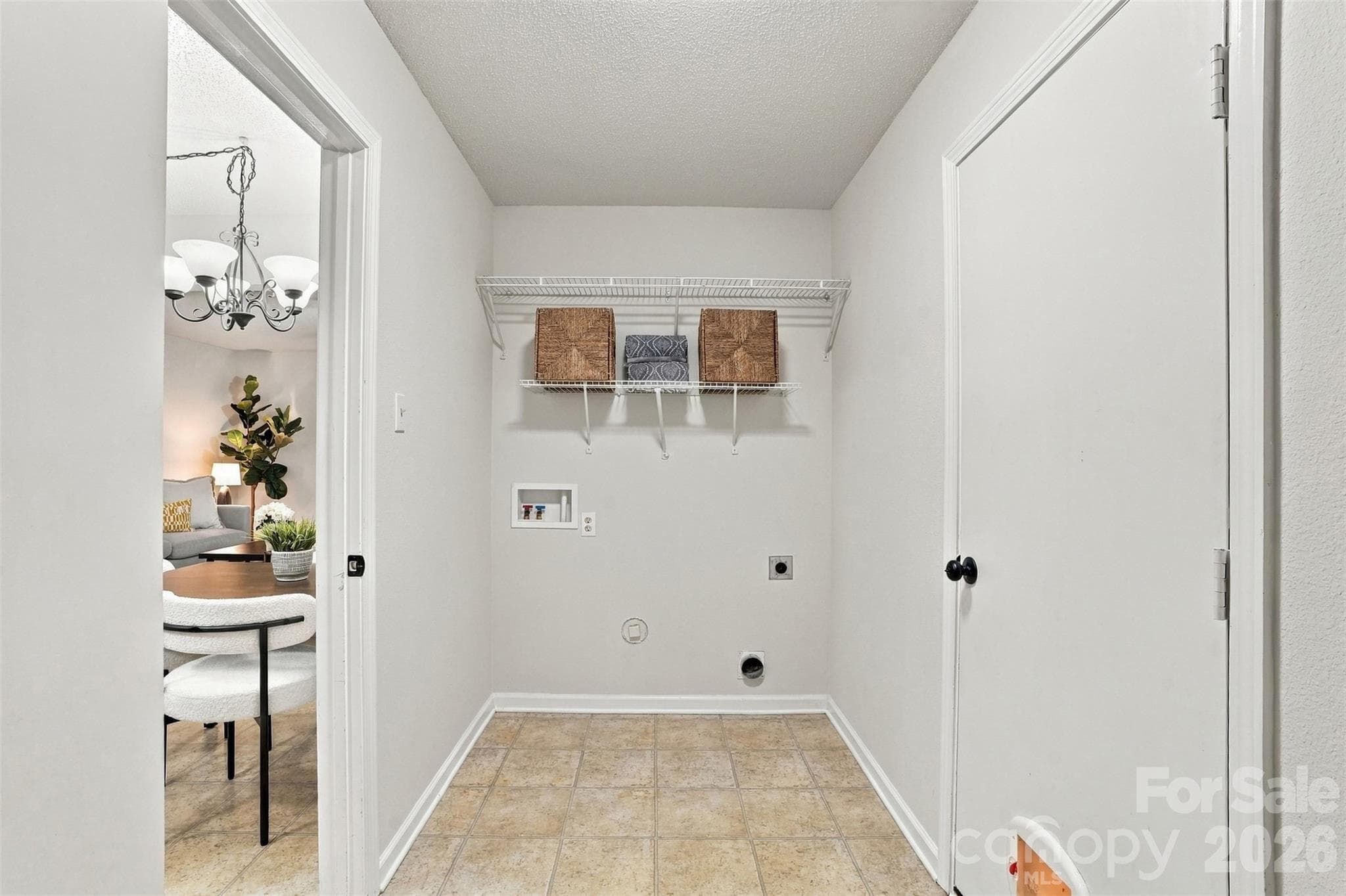 Laundry room between garage and kitchen. - 1901 Beckwith Lane, Waxhaw
