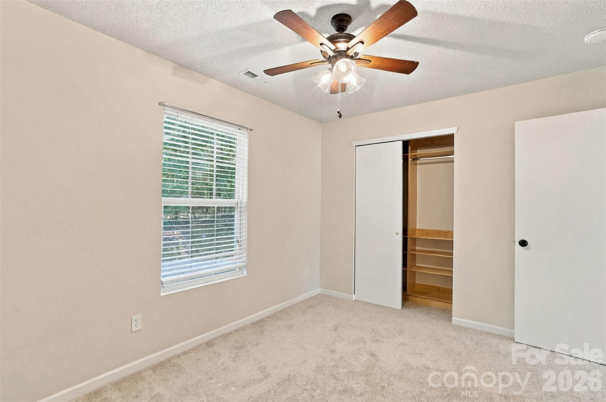 Second secondary bedroom w/build-in closet organizer. - 1901 Beckwith Lane, Waxhaw