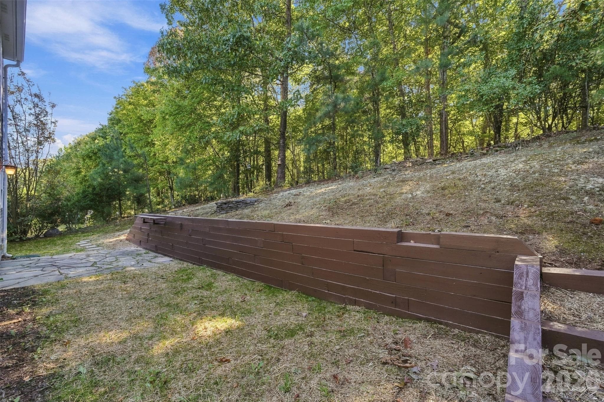 Retaining wall with grilling ledge. - 1901 Beckwith Lane, Waxhaw